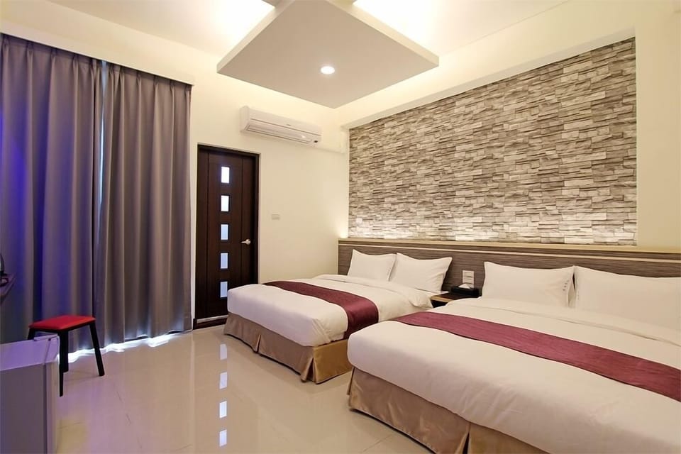 Grand Quadruple Room, 1 Bedroom | Minibar, desk, blackout drapes, soundproofing