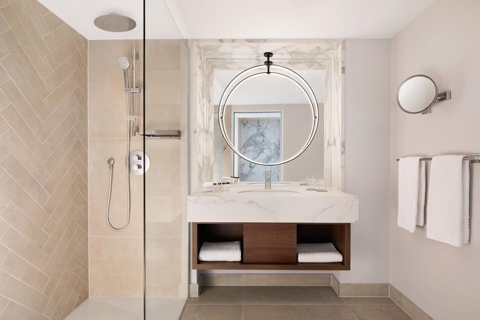 Shower, deep soaking tub, free toiletries, hair dryer