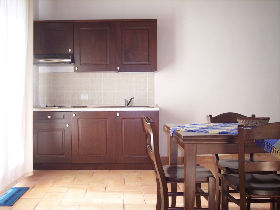 Apartment, 2 Bedrooms (Ulivo) | Living area | Flat-screen TV