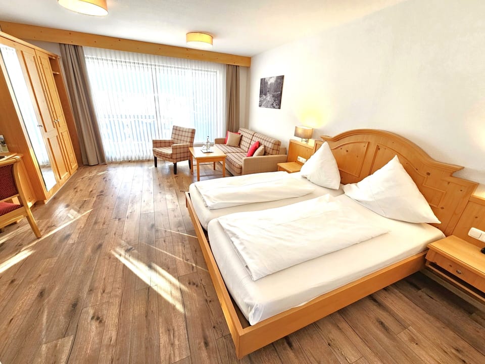 Comfort Quadruple Room, Balcony, Mountain View | Minibar, in-room safe, blackout drapes, soundproofing