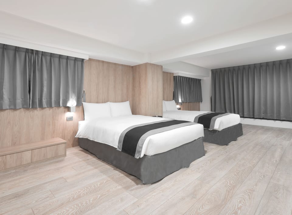 Family Room | Down comforters, desk, blackout drapes, free WiFi