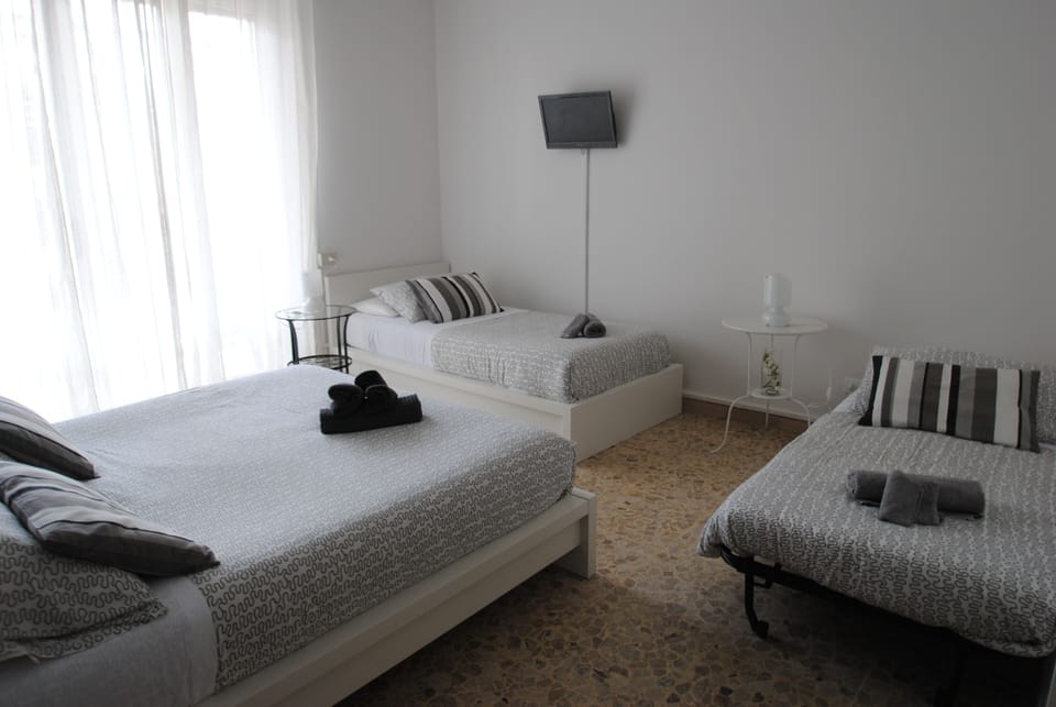 Quadruple Room, Ensuite (with balcony) | Desk, free cribs/infant beds, free WiFi, bed sheets