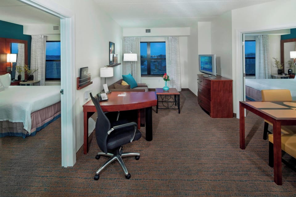 Premium bedding, down comforters, in-room safe, desk