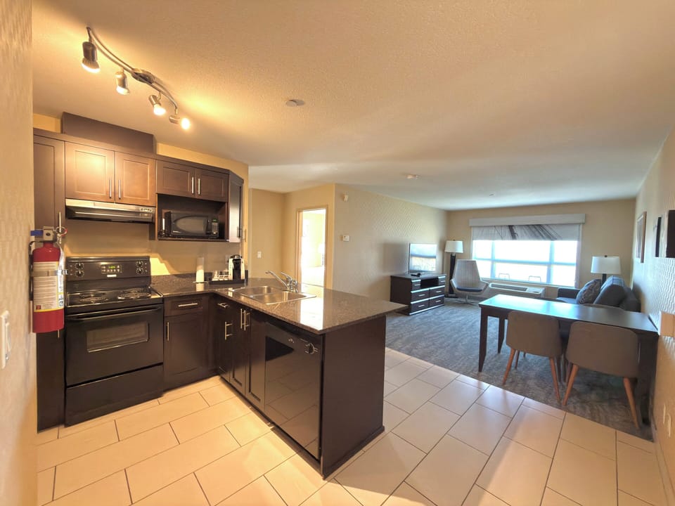Suite, 2 Bedrooms | Premium bedding, in-room safe, desk, blackout drapes