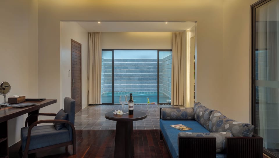 Private Pool Suite Villa | Living area | 42-inch LED TV with cable channels, TV
