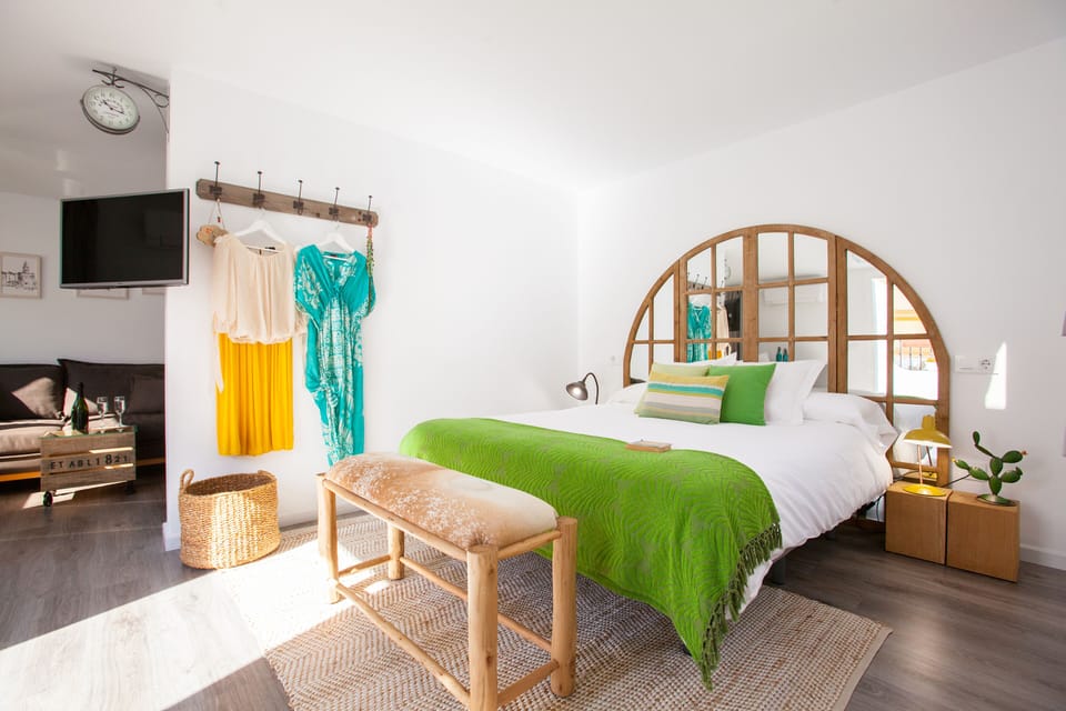 Arenal Suites Olehousing SCT | Down comforters, individually decorated, individually furnished