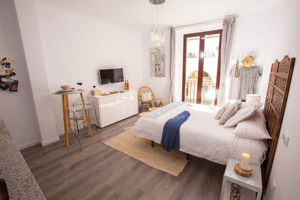 Arenal Suites Olehousing White DB | Down comforters, individually decorated, individually furnished