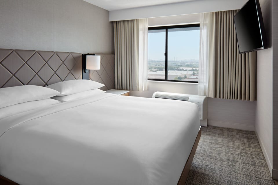 Suite, 1 Bedroom | In-room safe, desk, blackout drapes, iron/ironing board