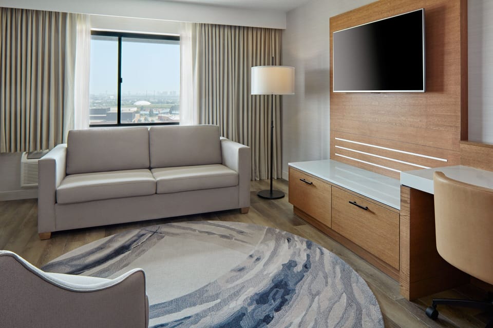 Suite, 1 Bedroom | Living room | Flat-screen TV, pay movies