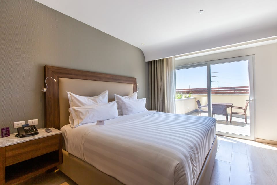 Deluxe Room, 1 King Bed, Terrace | In-room safe, desk, laptop workspace, soundproofing