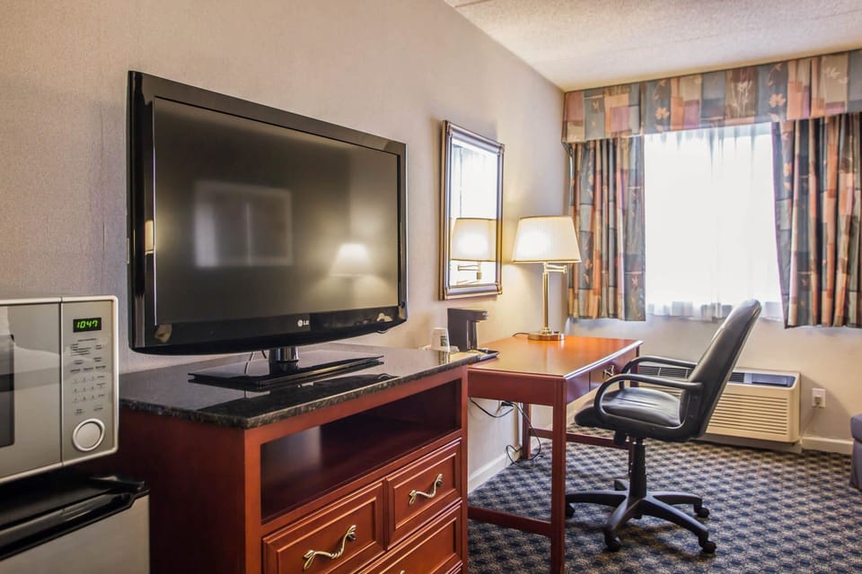 Desk, iron/ironing board, cribs (free), WiFi (free)