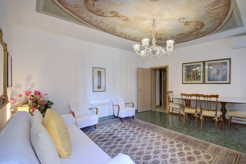 Apartment, Multiple Beds | Living area | Flat-screen TV