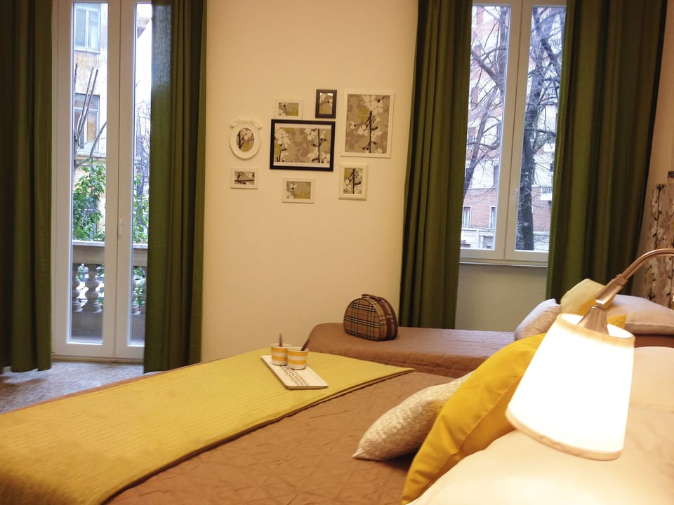 Triple Room | Desk, soundproofing, iron/ironing board, free cribs/infant beds