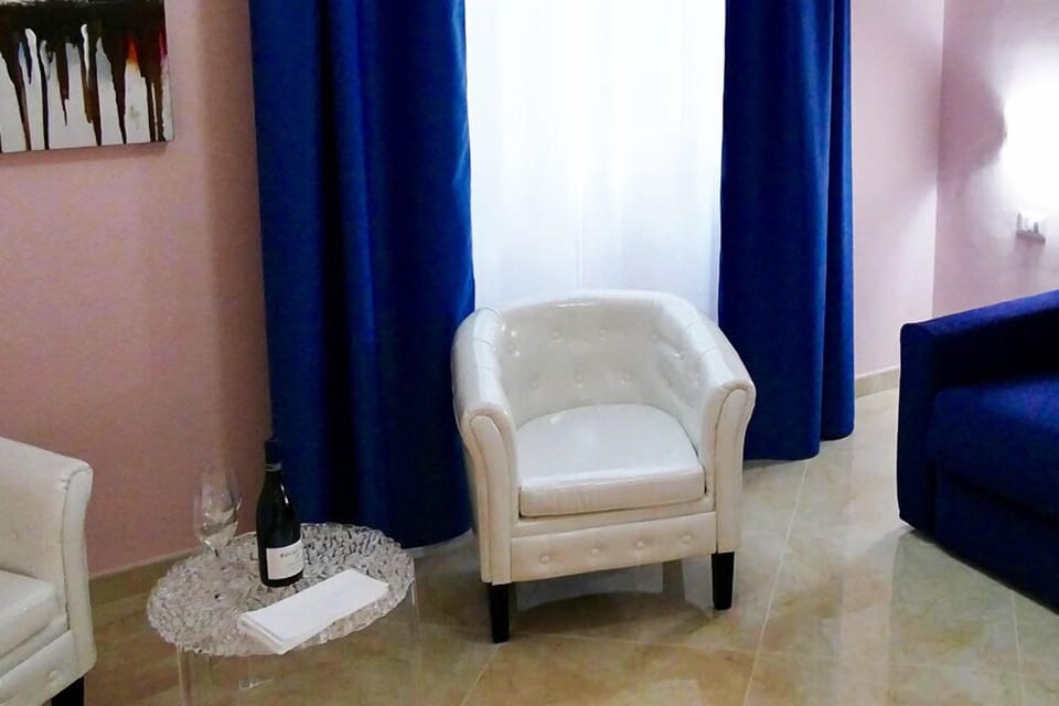 Studio, 1 Bedroom | Living area | Flat-screen TV