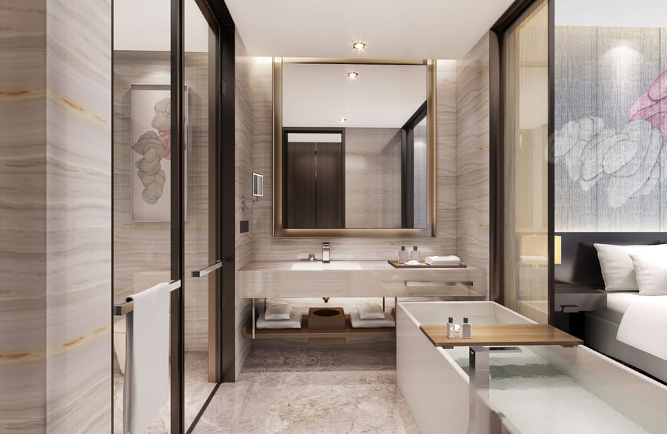 Separate tub and shower, free toiletries, hair dryer, bathrobes