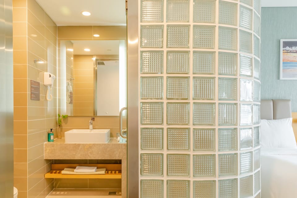 Shower, free toiletries, hair dryer, slippers