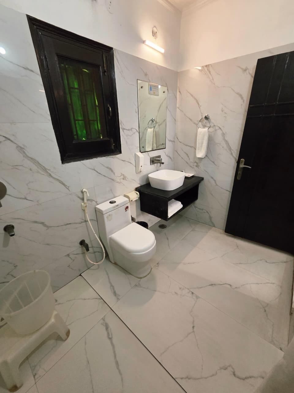 Shower, free toiletries, slippers, towels