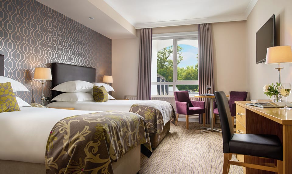 Desk, laptop workspace, free WiFi, bed sheets