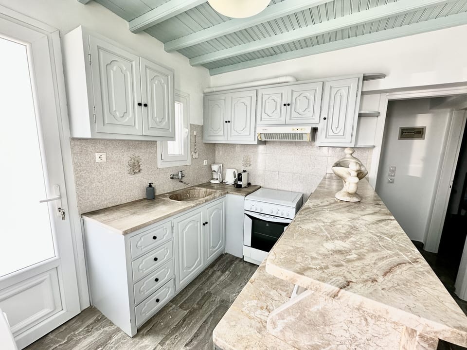 Comfort Apartment | Private kitchen | Coffee/tea maker, mini-fridge, stovetop, electric kettle