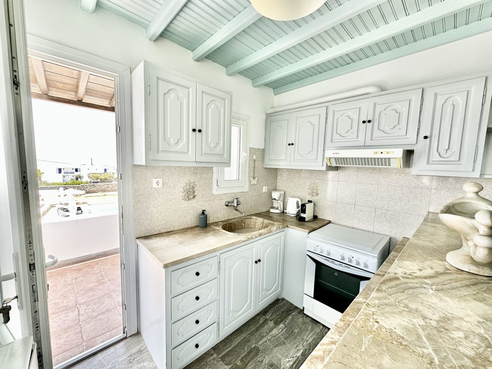 Comfort Apartment | Private kitchen | Coffee/tea maker, mini-fridge, stovetop, electric kettle