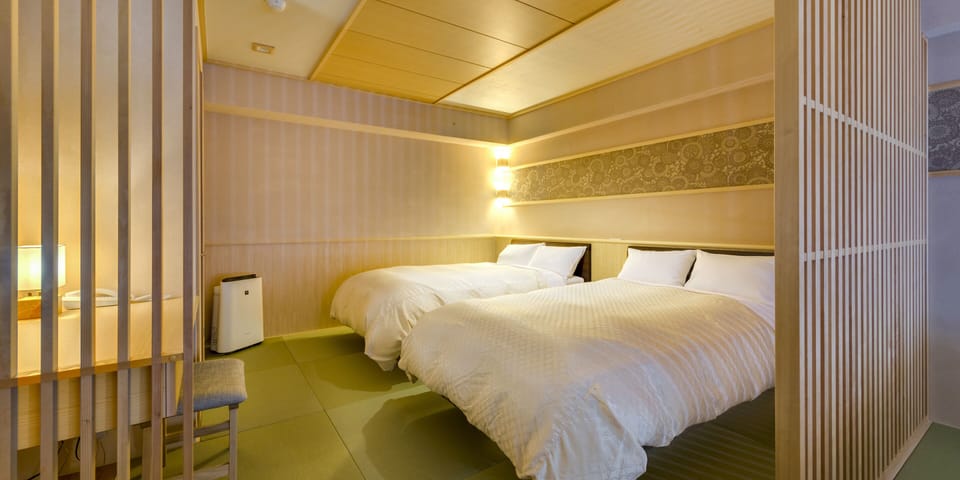 Traditional Quadruple Room, 4 Bedrooms, Non Smoking, Ocean View | In-room safe, desk, bed sheets