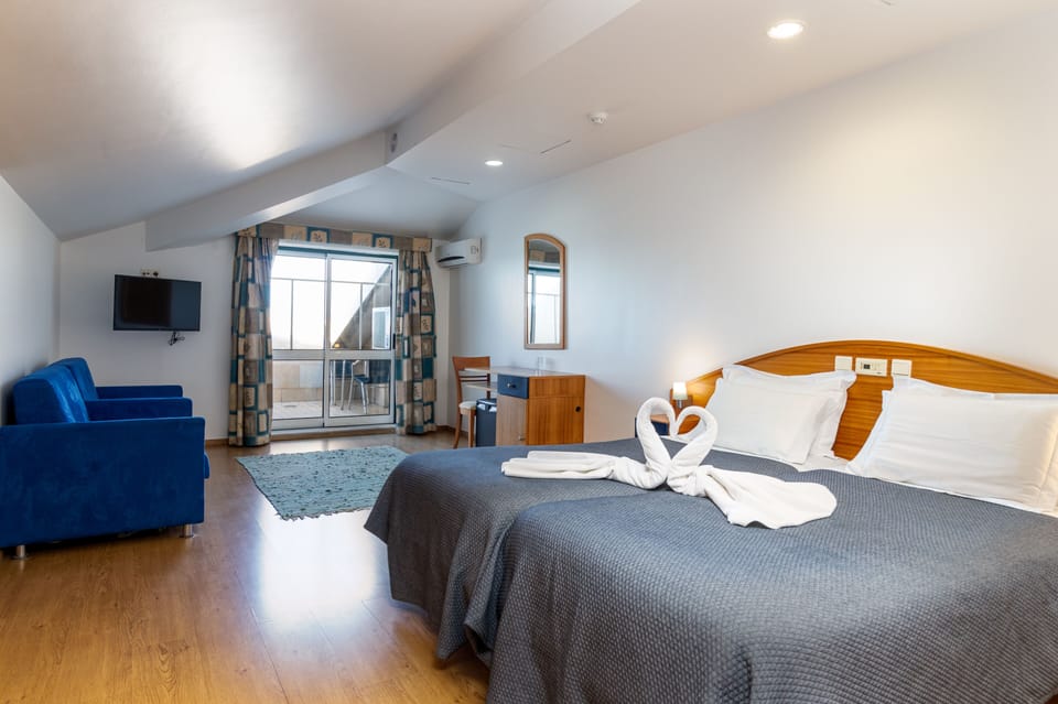 Family Suite, Balcony | Desk, blackout drapes, soundproofing, free WiFi