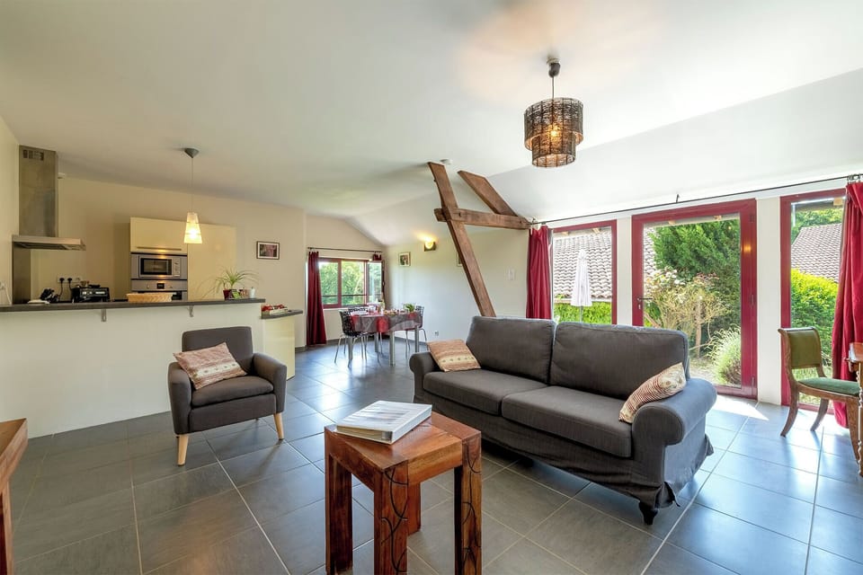 Superior Apartment, Private Bathroom (Gite Amélie) | Living area | 60-cm flat-screen TV with digital channels, TV, DVD player
