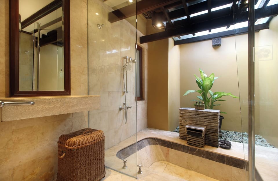 Alam Villa | Bathroom | Shower, free toiletries, hair dryer, towels