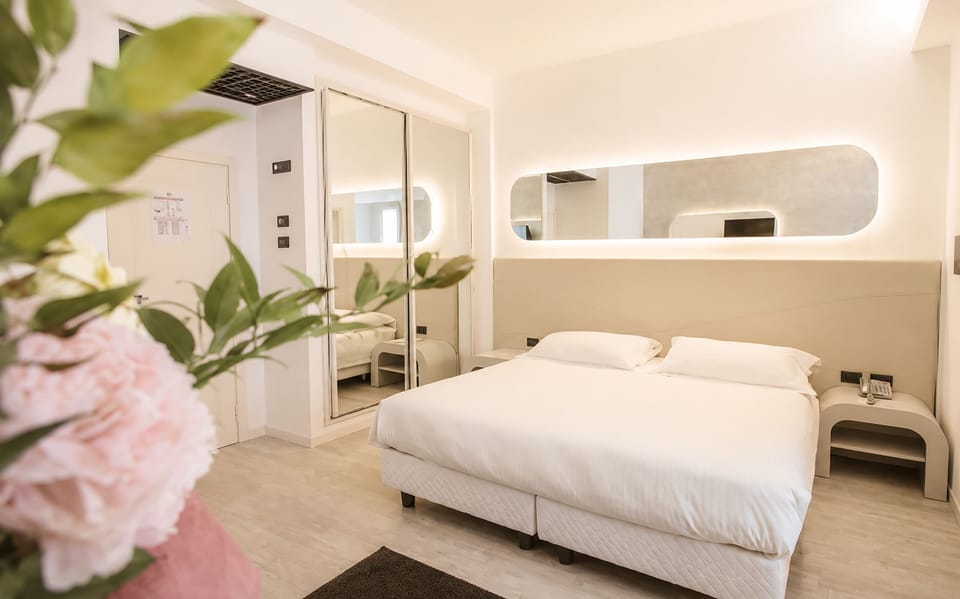 Superior Double or Twin Room | Minibar, in-room safe, desk, blackout drapes
