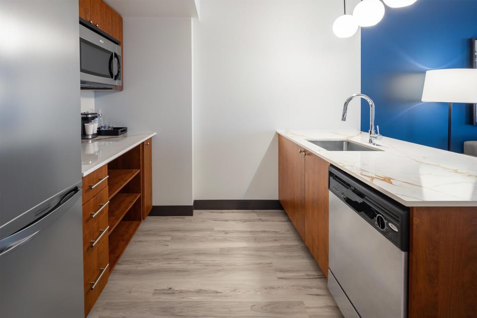 Deluxe Suite (2 Double Beds with Sofa bed) | Private kitchen | Coffee/tea maker, full-size fridge, microwave, dishwasher