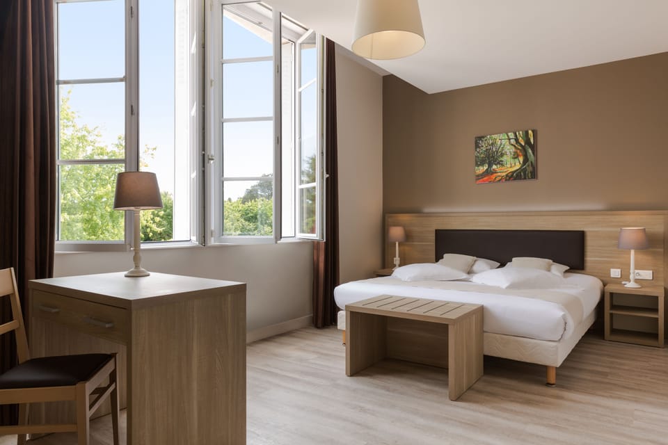 Superior Double Room | Minibar, in-room safe, individually decorated, desk