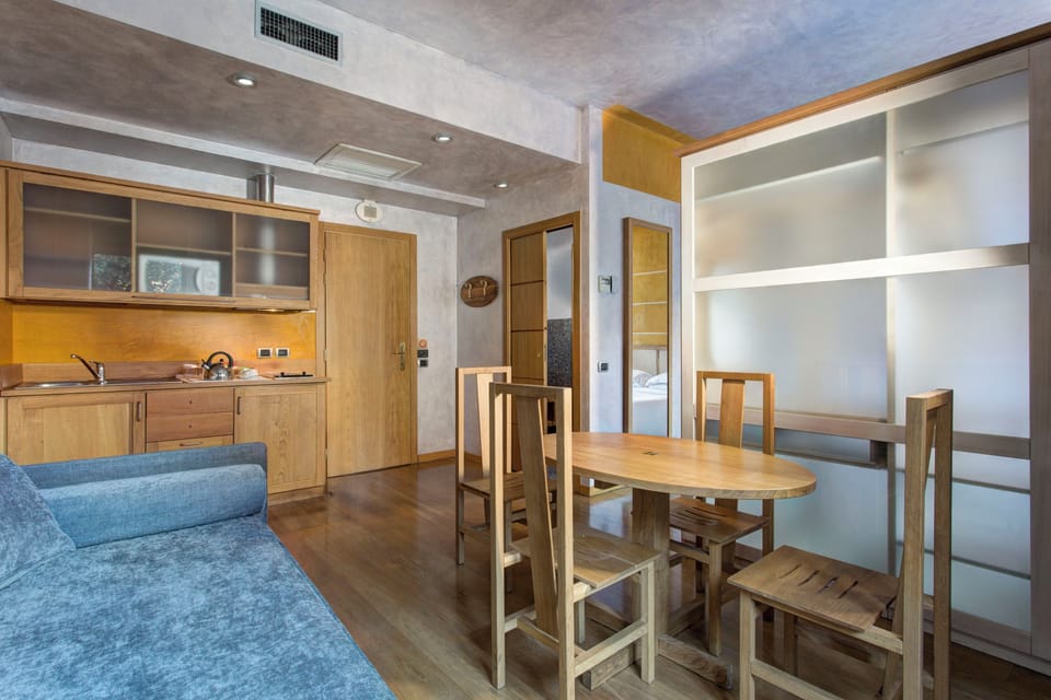 Junior Suite - Separate Building | Living area | 42-inch LCD TV with satellite channels, TV