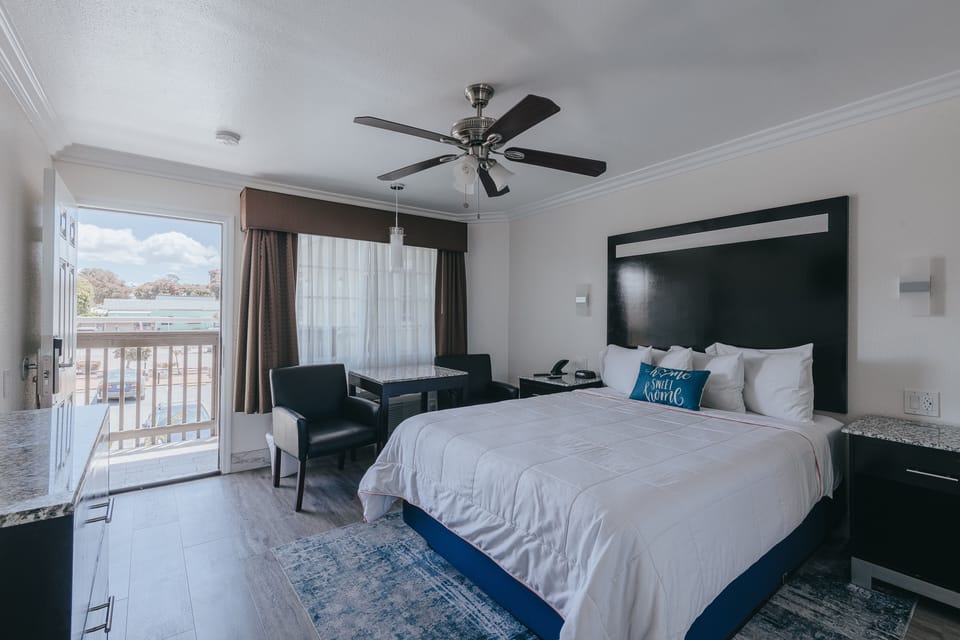Deluxe Partial View Queen Room - Upstairs, Non-Smoking, No Pets | Premium bedding, pillowtop beds, desk, laptop workspace