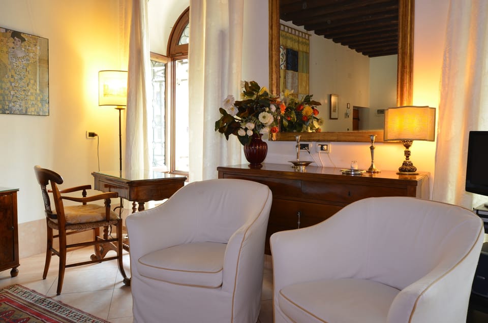 Apartment, Canal View | Living area | Flat-screen TV