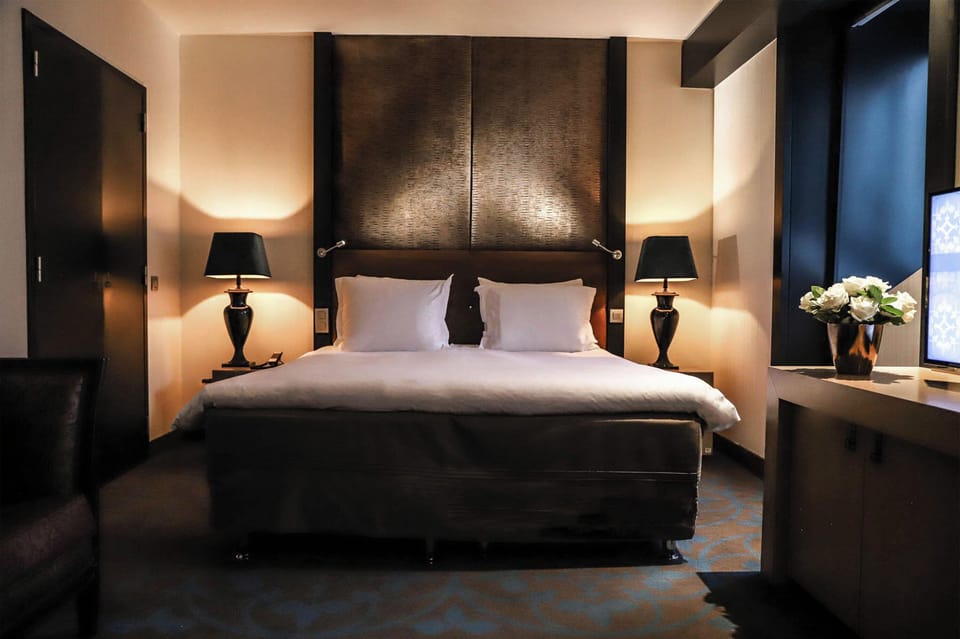 Executive Room | Premium bedding, minibar, in-room safe, desk