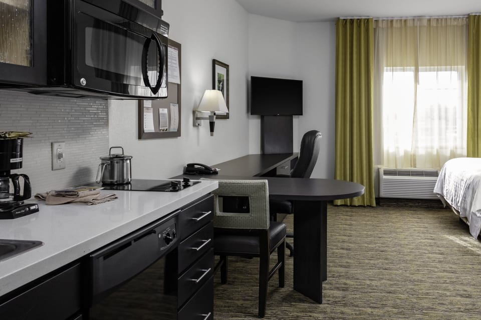 In-room safe, desk, iron/ironing board, cribs (free)