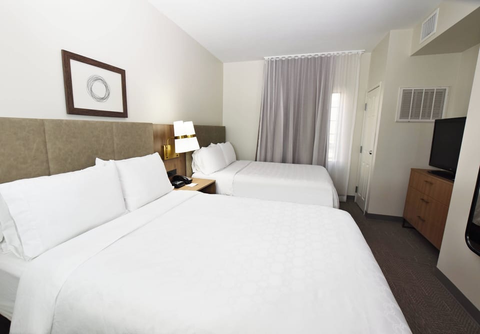 Pillowtop beds, in-room safe, blackout drapes, iron/ironing board