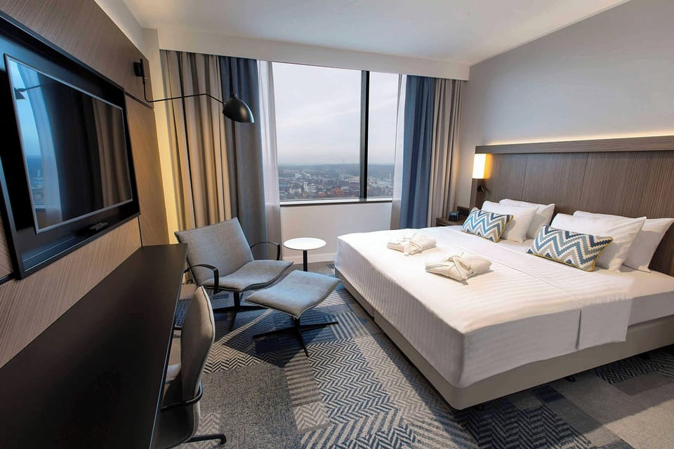 Premium bedding, in-room safe, desk, soundproofing