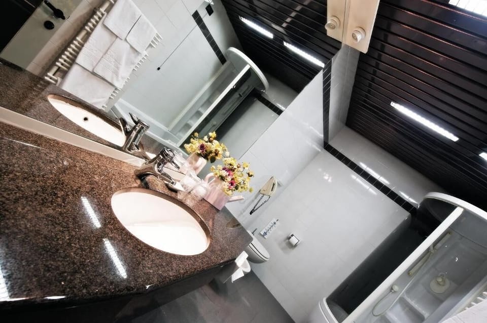 Eco-friendly toiletries, hair dryer, slippers