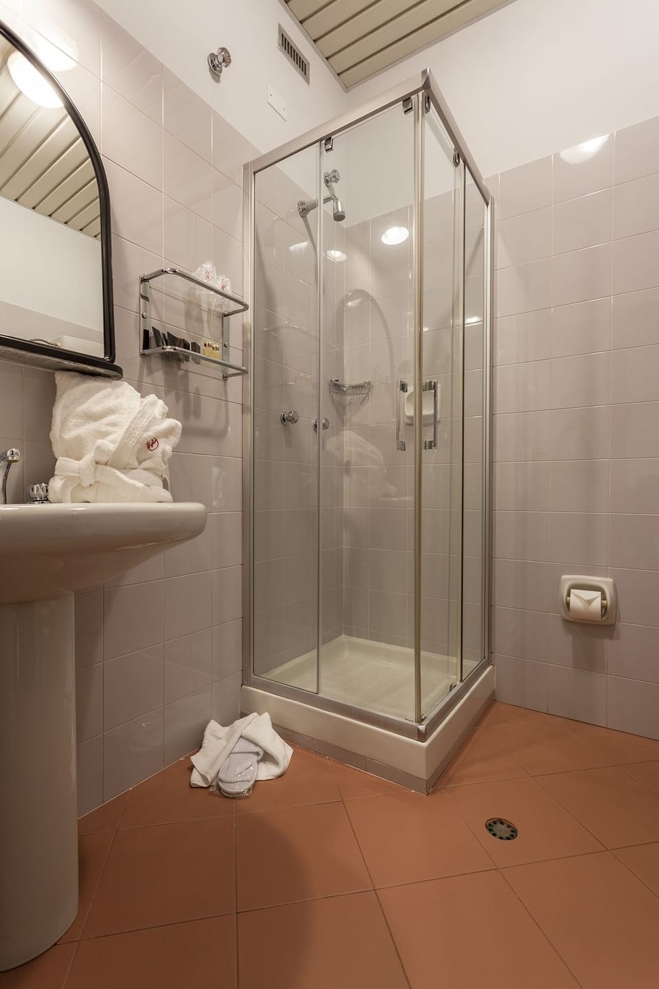 Shower, rainfall showerhead, designer toiletries, hair dryer