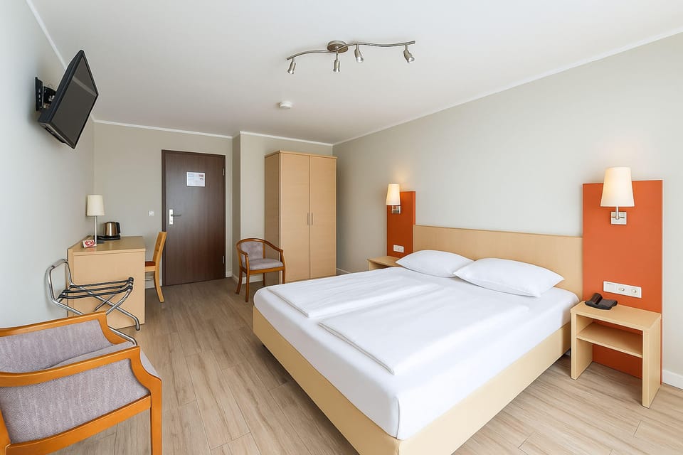 Double Room, Air conditioning | Minibar, in-room safe, desk, blackout drapes