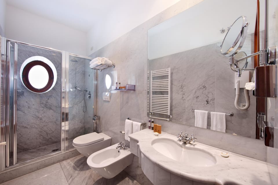 Free toiletries, hair dryer, bidet, towels