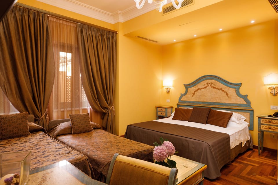 Superior Quadruple Room | Minibar, in-room safe, soundproofing, iron/ironing board
