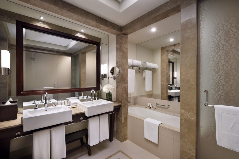 Separate tub and shower, free toiletries, hair dryer, bathrobes