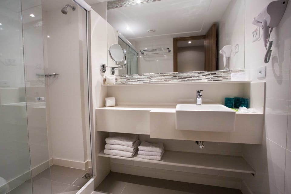 Shower, free toiletries, hair dryer, towels