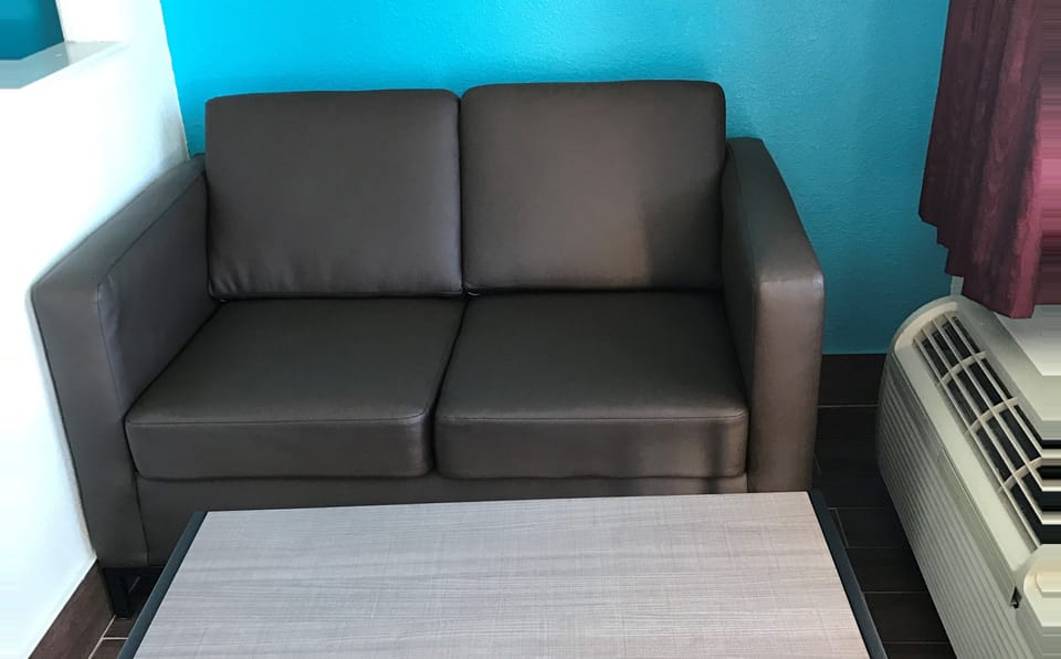 Single Room, Accessible | Living area | Flat-screen TV