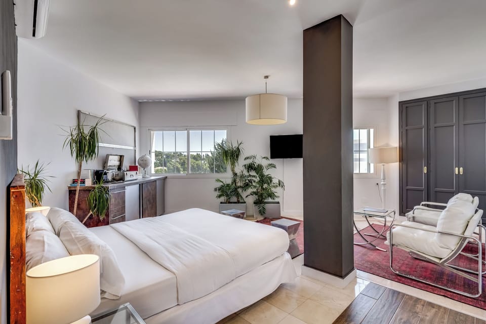 Superior Room, Garden View | Minibar, in-room safe, individually decorated, individually furnished