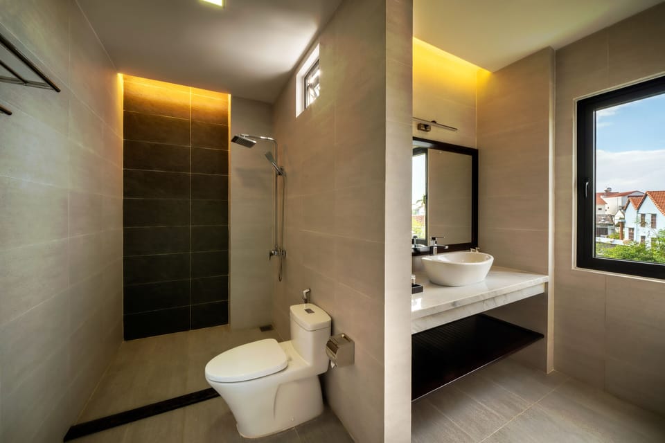 Serene Family Garden View | Bathroom | Combined shower/tub, free toiletries, hair dryer, slippers