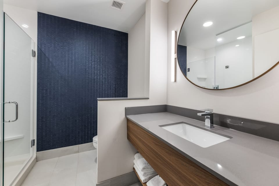Shower, free toiletries, hair dryer, towels
