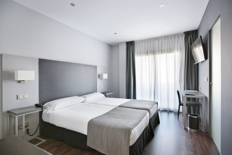 Double or Twin Room | Premium bedding, minibar, in-room safe, individually furnished